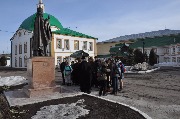 У памятника святителю Герману Казанскому.