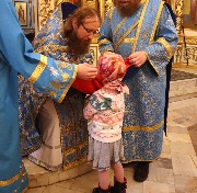 Причащается Екатерина